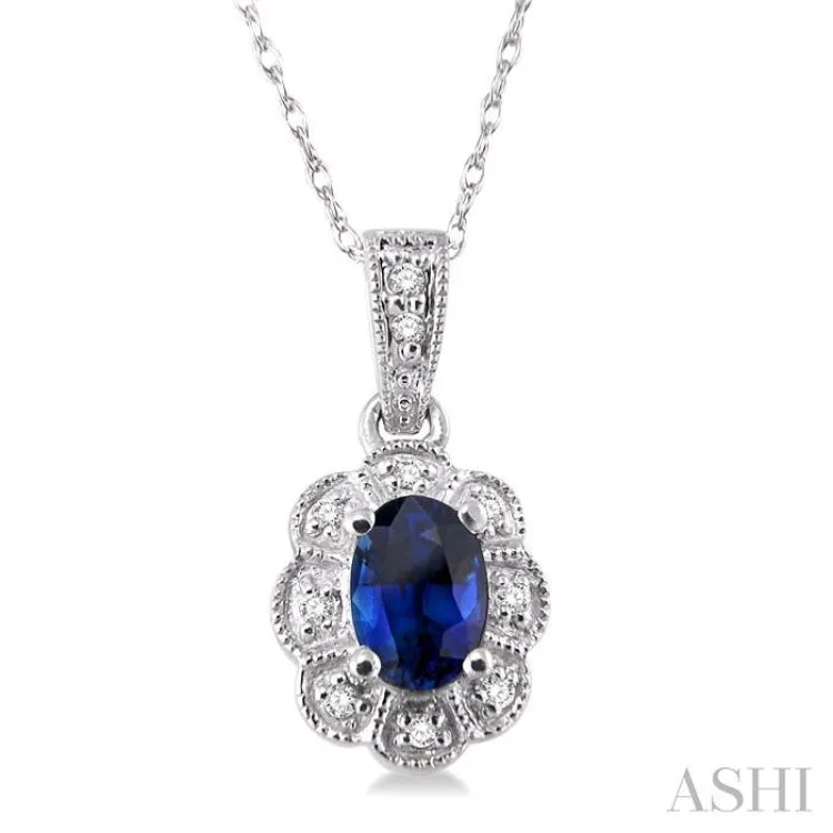 6x4mm Oval Cut Sapphire and 1/20 Ctw Single Cut Diamond Pendant in 10K White Gold with Chain