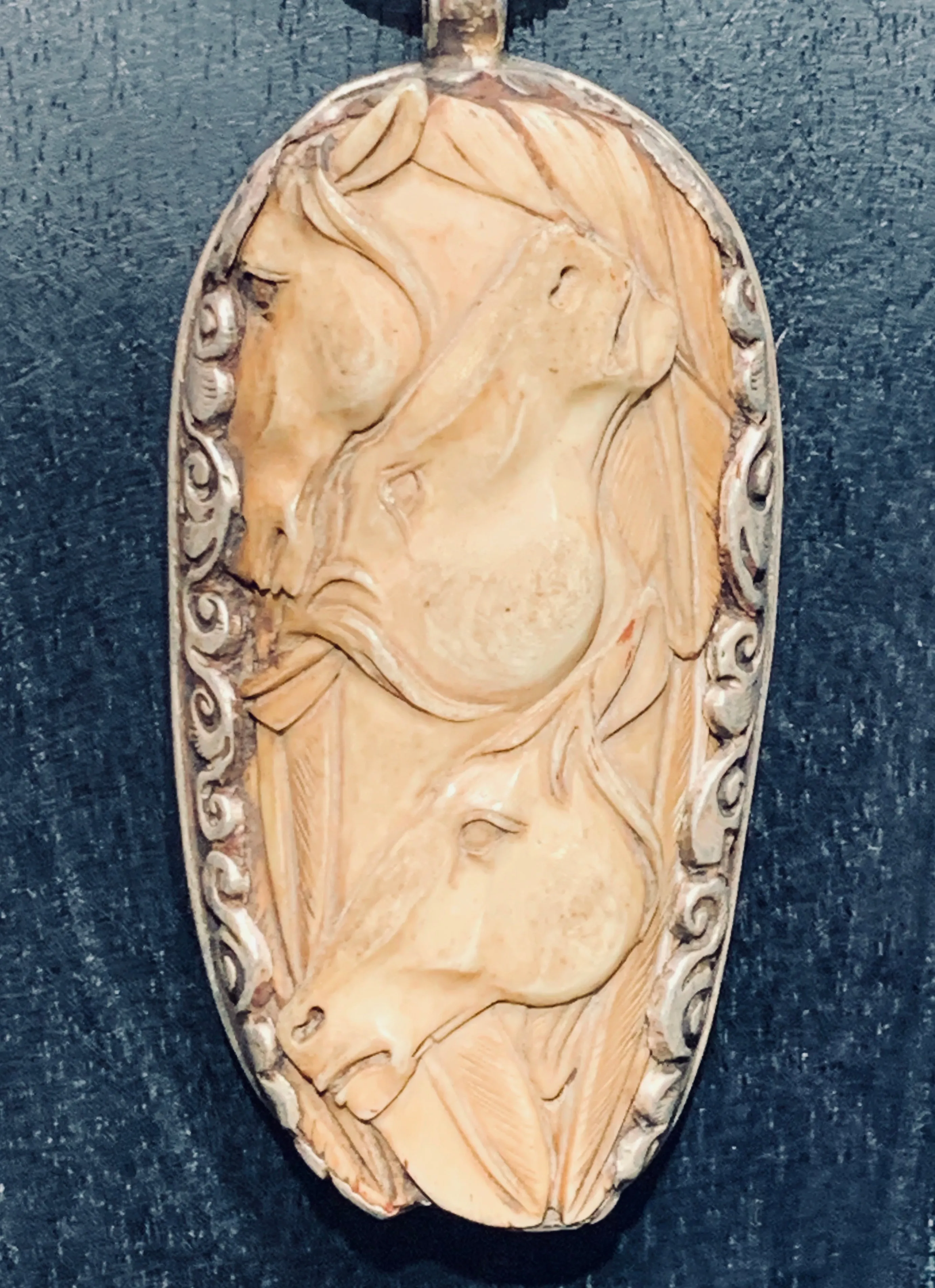 Hand Carved Trinity Stallion Pendant